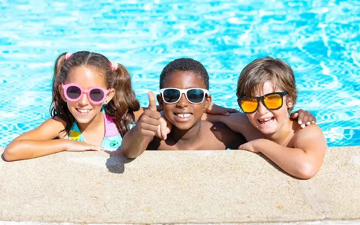 children swimming pool smile
